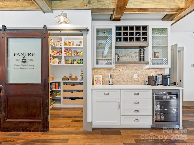 pantry with beverage cooler and visible vents