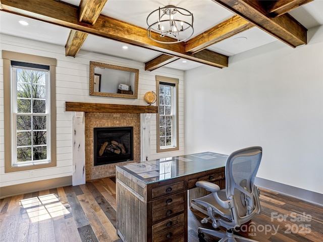 office featuring baseboards, dark wood finished floors, a chandelier, and beamed ceiling