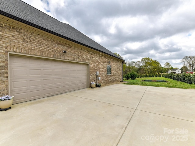 3012 Ocean Dr, Monroe, NC 28110 - view of side of property featuring driveway, brick siding, a shingled roof, and a yard