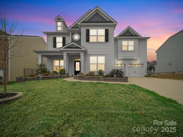 9582 Creighton Rd NW, Concord, NC 28027 - view of front of home featuring driveway, a garage, a lawn, and board and batten siding