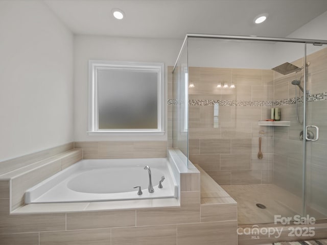9582 Creighton Rd NW, Concord, NC 28027 - bathroom featuring recessed lighting, a stall shower, and a bath