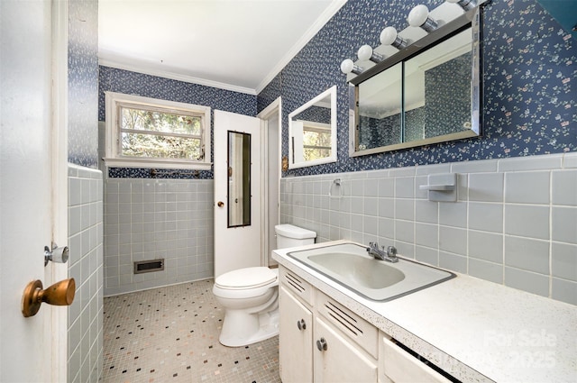 340 Sardis Rd N, Charlotte, NC 28270 - bathroom with toilet, vanity, wainscoting, wallpapered walls, and tile walls