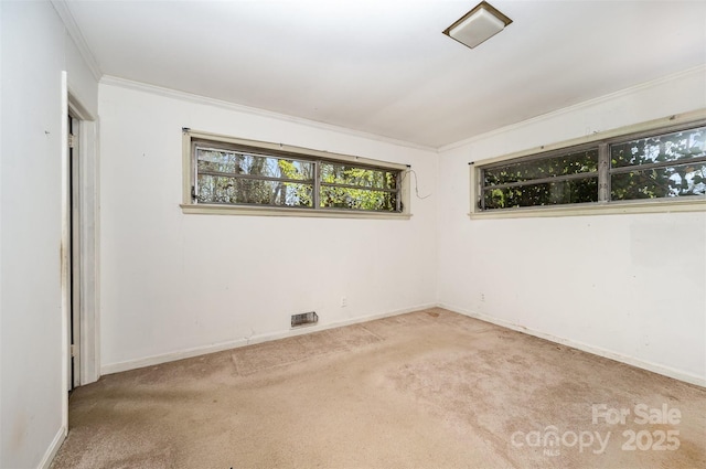 340 Sardis Rd N, Charlotte, NC 28270 - carpeted spare room featuring baseboards, visible vents, and crown molding