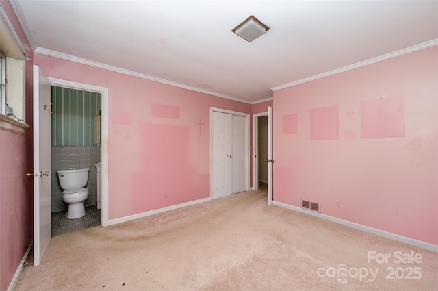 340 Sardis Rd N, Charlotte, NC 28270 - unfurnished bedroom featuring crown molding, carpet flooring, baseboards, visible vents, and ensuite bathroom