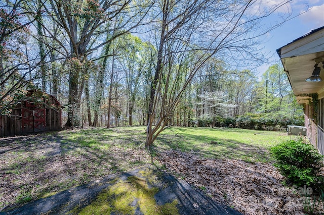 340 Sardis Rd N, Charlotte, NC 28270 - view of yard featuring an outbuilding and a storage unit