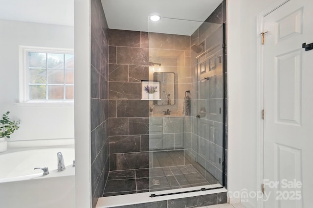 bathroom featuring a shower stall, recessed lighting, and a garden tub