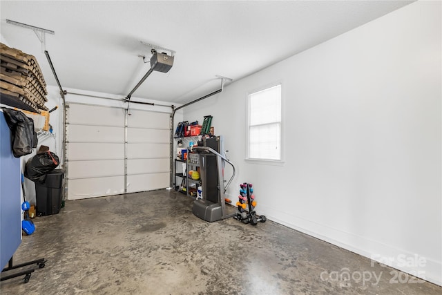 garage featuring a garage door opener