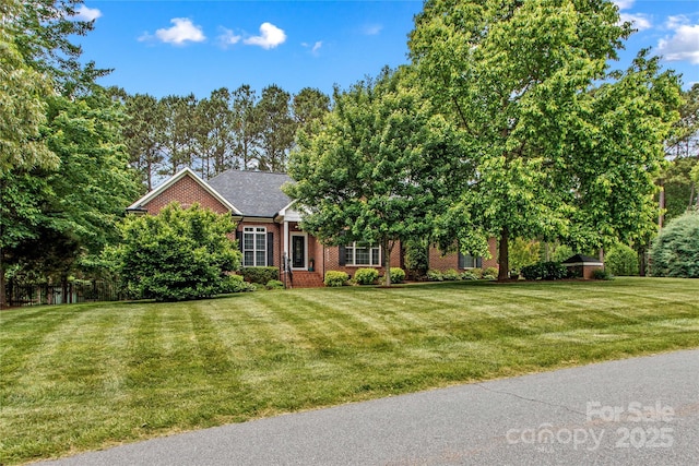 4159 Isle Of Pines Dr, Denver, NC 28037 - view of front of property with brick siding and a front yard