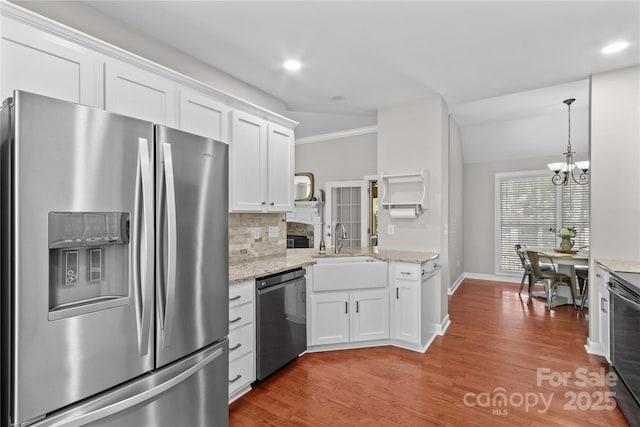 4159 Isle Of Pines Dr, Denver, NC 28037 - kitchen featuring stainless steel fridge with ice dispenser, dishwasher, a sink, white cabinets, and wood finished floors