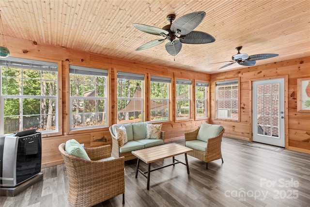 4159 Isle Of Pines Dr, Denver, NC 28037 - sunroom with plenty of natural light, wood ceiling, wood walls, a wooden deck, and wood finished floors