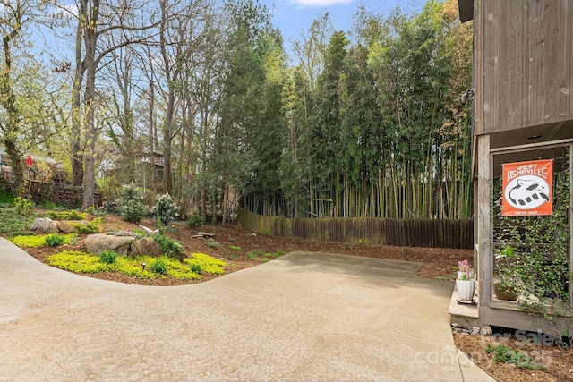 view of patio / terrace featuring fence