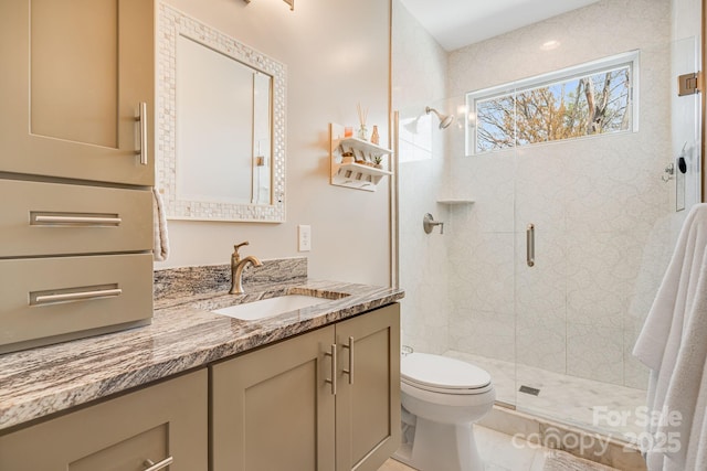 full bathroom featuring a shower stall, tile patterned flooring, vanity, and toilet