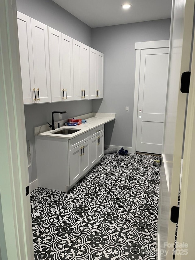 27 George Allen Rdg, Arden, NC 28704 - washroom featuring a sink, baseboards, and recessed lighting