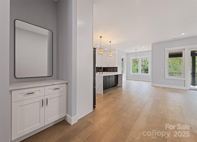 27 George Allen Rdg, Arden, NC 28704 - corridor with a chandelier, light wood finished floors, and recessed lighting