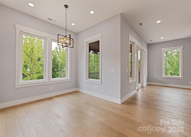 27 George Allen Rdg, Arden, NC 28704 - empty room featuring light wood-type flooring, a chandelier, and recessed lighting