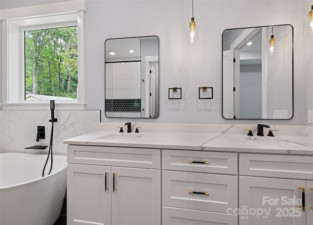 27 George Allen Rdg, Arden, NC 28704 - bathroom with double vanity, a freestanding bath, and a shower