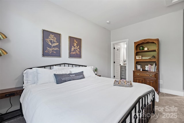 bedroom featuring baseboards and carpet floors