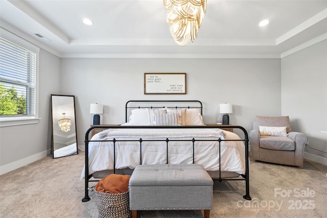 bedroom featuring baseboards, a tray ceiling, a notable chandelier, and carpet