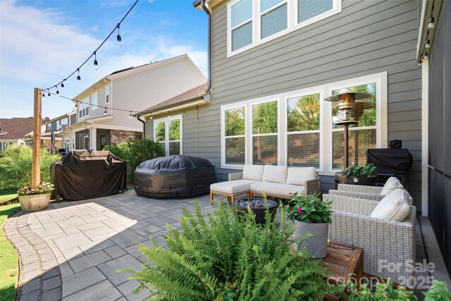 view of patio / terrace with a grill and an outdoor hangout area
