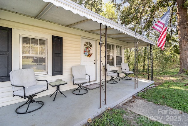 view of patio featuring covered porch