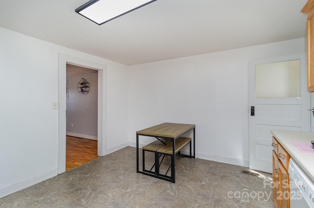 empty room with baseboards