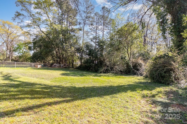 view of yard with fence