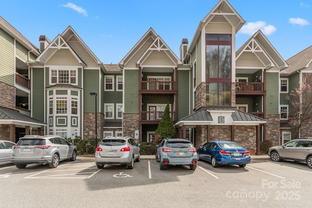 1000 Olde Eastwood Village Blvd Unit 307, Asheville, NC 28803 - view of building exterior with uncovered parking