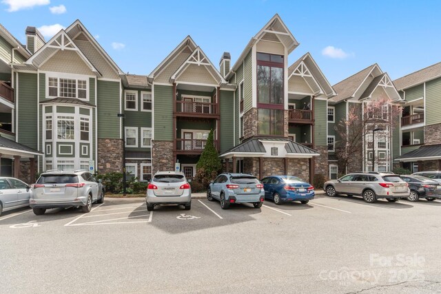 1000 Olde Eastwood Village Blvd Unit 307, Asheville, NC 28803 - view of property with uncovered parking