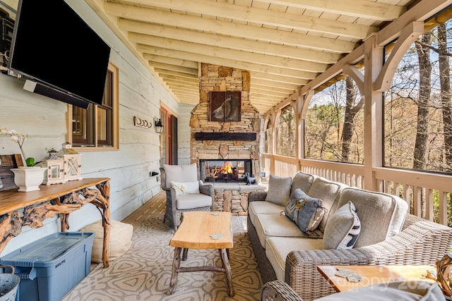 sunroom with beam ceiling