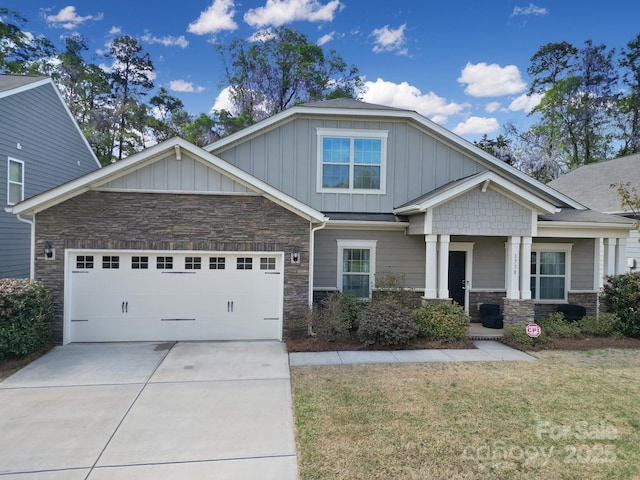 1718 Still River Way, Fort Mill, SC 29708 - craftsman inspired home featuring driveway, stone siding, a front lawn, and board and batten siding