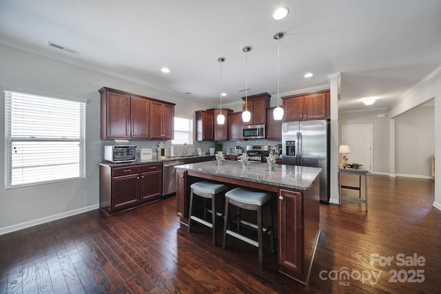 1718 Still River Way, Fort Mill, SC 29708 - kitchen with dark wood-style flooring, a sink, visible vents, and stainless steel appliances