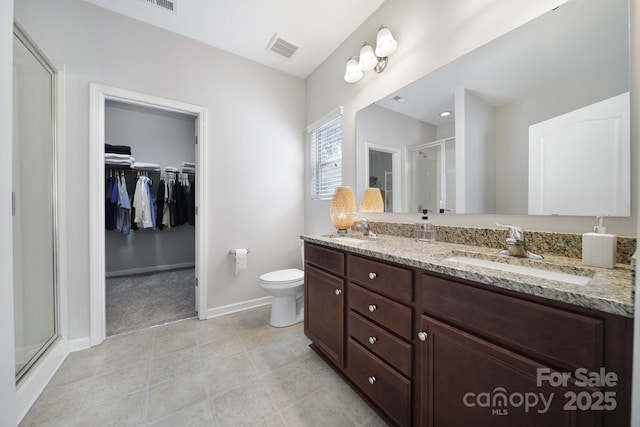 1718 Still River Way, Fort Mill, SC 29708 - bathroom featuring a stall shower, double vanity, a sink, and visible vents