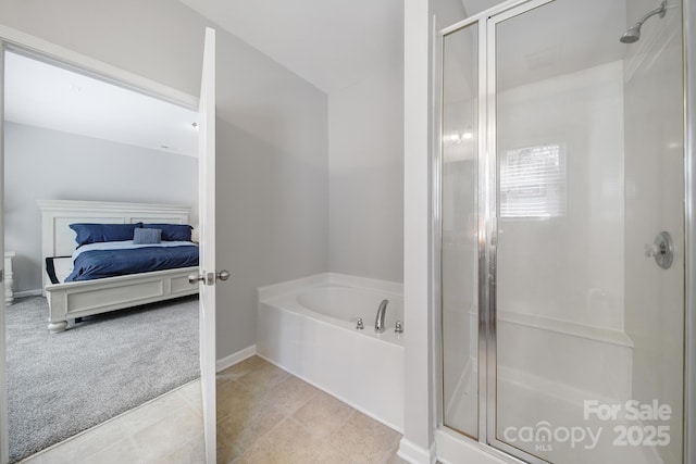 1718 Still River Way, Fort Mill, SC 29708 - ensuite bathroom featuring baseboards, a shower stall, ensuite bath, and a garden tub