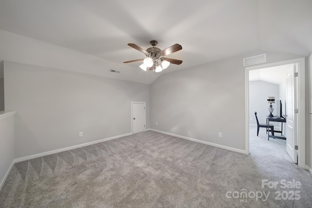 1718 Still River Way, Fort Mill, SC 29708 - carpeted spare room with visible vents, baseboards, vaulted ceiling, and a ceiling fan