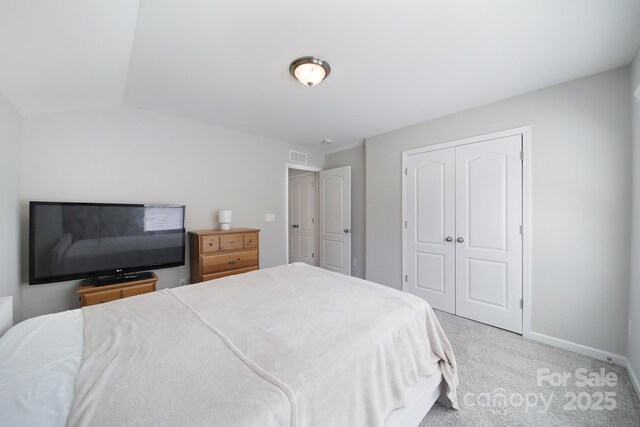 1718 Still River Way, Fort Mill, SC 29708 - carpeted bedroom featuring vaulted ceiling, visible vents, a closet, and baseboards