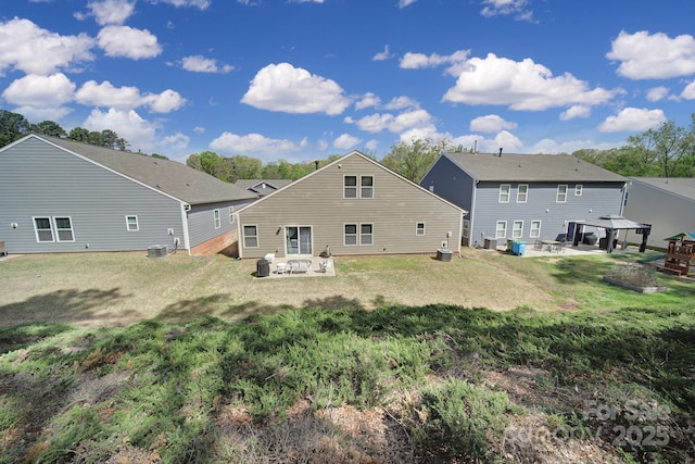 1718 Still River Way, Fort Mill, SC 29708 - rear view of property with a yard, a gazebo, and central AC