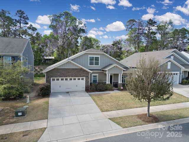 1718 Still River Way, Fort Mill, SC 29708 - view of front of home with a garage, a front yard, driveway, and board and batten siding