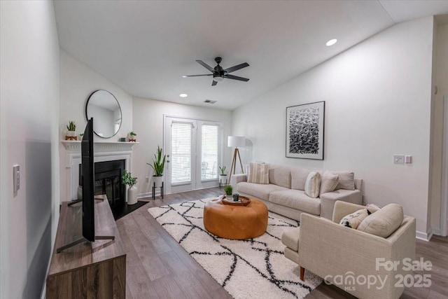 17143 Red Feather Dr, Charlotte, NC 28277 - living area featuring a ceiling fan, recessed lighting, vaulted ceiling, and wood finished floors
