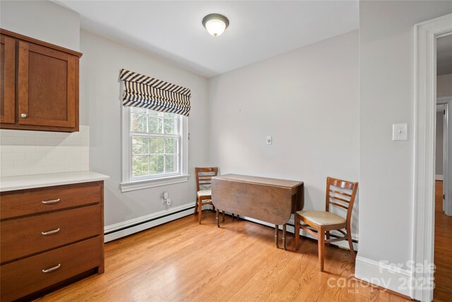 431 Sullivan Rd, Statesville, NC 28677 - living area featuring baseboard heating and light wood finished floors