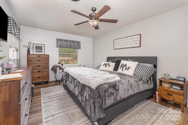 bedroom with wood finished floors and ceiling fan