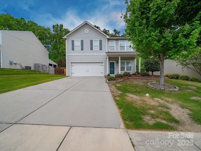 113 Devynn Ridge Ct, Mount Holly, NC 28120 - view of front of property featuring a front yard, a garage, driveway, central AC, and fence