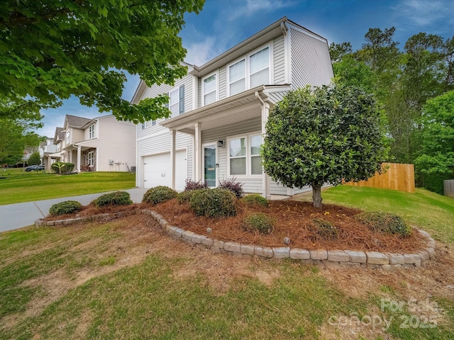 113 Devynn Ridge Ct, Mount Holly, NC 28120 - view of front facade featuring concrete driveway, a front lawn, a garage, and fence