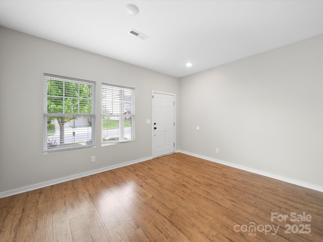 113 Devynn Ridge Ct, Mount Holly, NC 28120 - empty room featuring recessed lighting, visible vents, baseboards, and light wood-type flooring