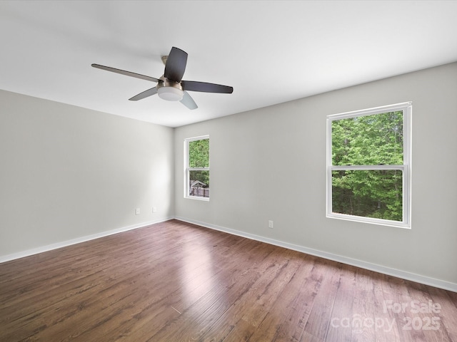 113 Devynn Ridge Ct, Mount Holly, NC 28120 - empty room featuring wood finished floors, ceiling fan, and baseboards