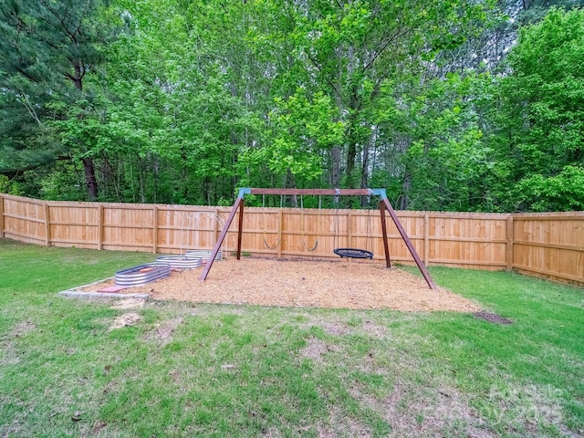 113 Devynn Ridge Ct, Mount Holly, NC 28120 - view of play area with a lawn and a fenced backyard