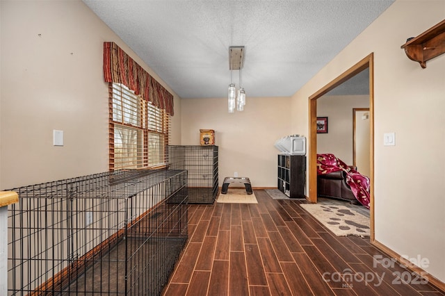 266 Asheland Dr, Ellenboro, NC 28040 - hall with a textured ceiling, baseboards, and wood finished floors