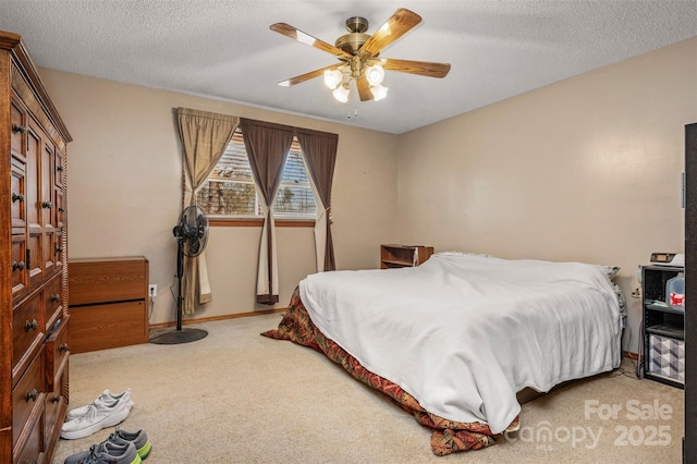 266 Asheland Dr, Ellenboro, NC 28040 - carpeted bedroom with a textured ceiling, ceiling fan, and baseboards