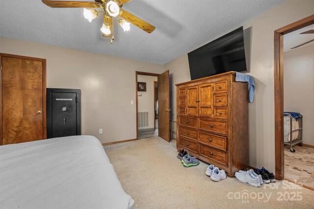 266 Asheland Dr, Ellenboro, NC 28040 - carpeted bedroom with a textured ceiling, ceiling fan, baseboards, and visible vents