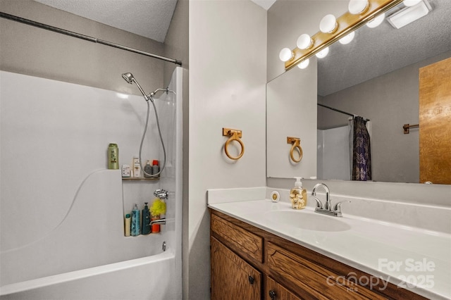 266 Asheland Dr, Ellenboro, NC 28040 - bathroom with shower / tub combo, vanity, and a textured ceiling