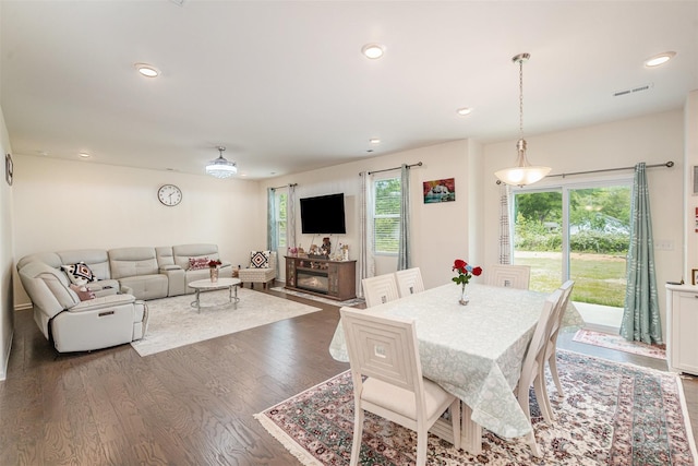 dining room featuring recessed lighting, wood finished floors, and visible vents